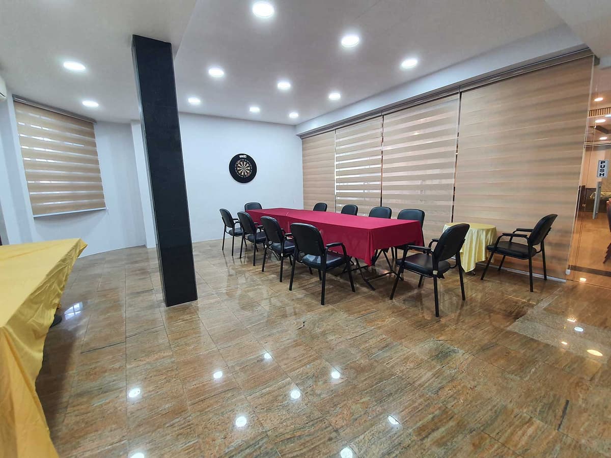 The Recreation Room at Sindhu House, set up with a meeting table